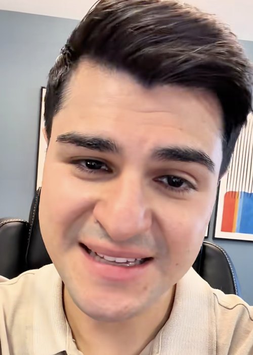 Boomer talking to camera in his office